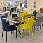 Crossly Glass Top Rectangular Dining Table Set in our Showroom