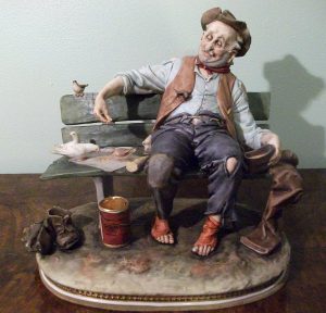 Tramp feeding pigeons by Bruno Merli