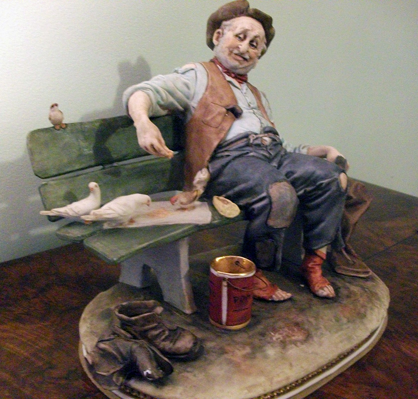 Tramp feeding pigeons by Bruno Merli