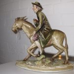 Priest riding a Mule by Borsato