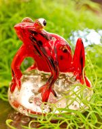 Glass Red Jungle Frog Paperweight in our Showroom