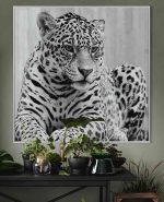 Leopard glass art picture on display