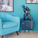 Black and Blue Yoga Lady Kneeling Sculpture in our Showroom