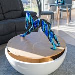 Black and blue yoga lady sculpture in our showroom