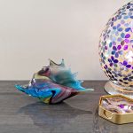 Glass Blue and Purple Seashell in our Showroom