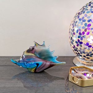 Glass Blue and Purple Seashell in our Showroom