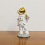 Coffee on the Moon Astronaut Figurine on display