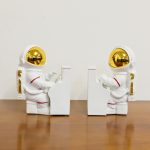 Astronaut Piano Book End Figurines on display