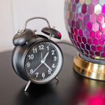 Small Light Up Black Alarm Clock in our Showroom