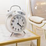 Small Light Up White Alarm Clock in our Showroom