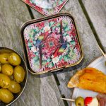 Myrtle and Mary Flower Bomb Square Coaster Set on Display