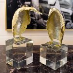 Gold Penguin Ornaments in our Showroom - Close Up