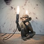 Monkey Holding Bulb Lamp in our Showroom