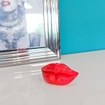 Small Red Lips Sculpture on display in our Showroom