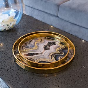 Circular Gold Tray Set With Oyster Design in our Showroom