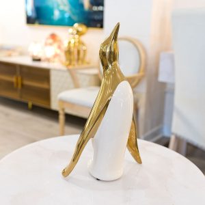 Ceramic Large Gold Penguin in our Showroom