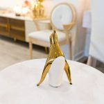 Ceramic Small Gold Penguin in our Showroom