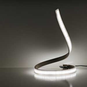LED Snake Table Lamp on display in a dark room
