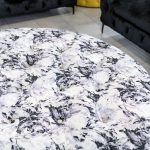 Large Round Floral Buttoned Pouffe in our Showroom - Corner