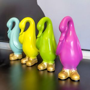 Painted Duck in Gold Boots on display in our Showroom